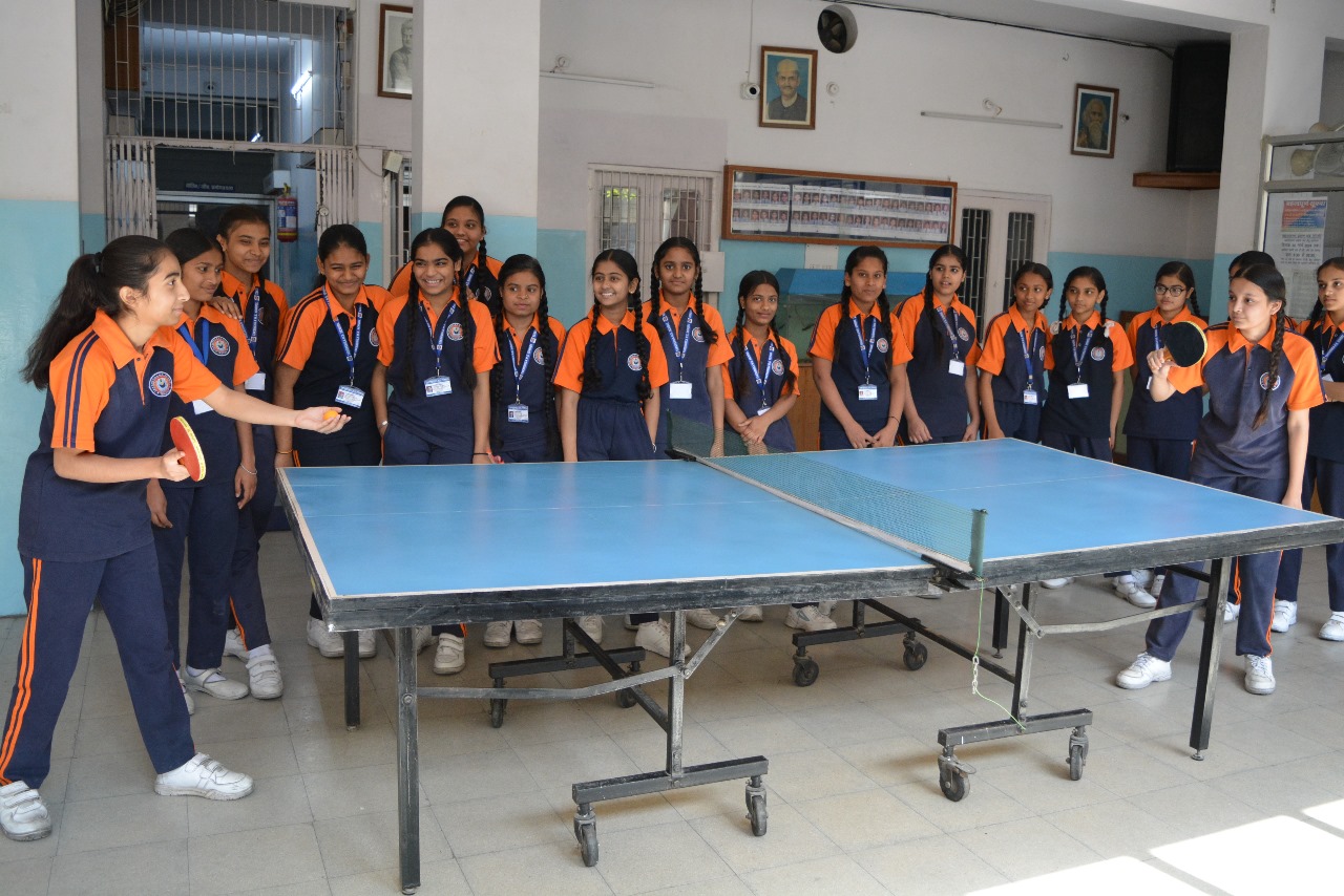 Students in the indoor games area